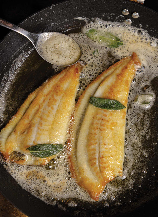 Brill fillets with garlic butter and age