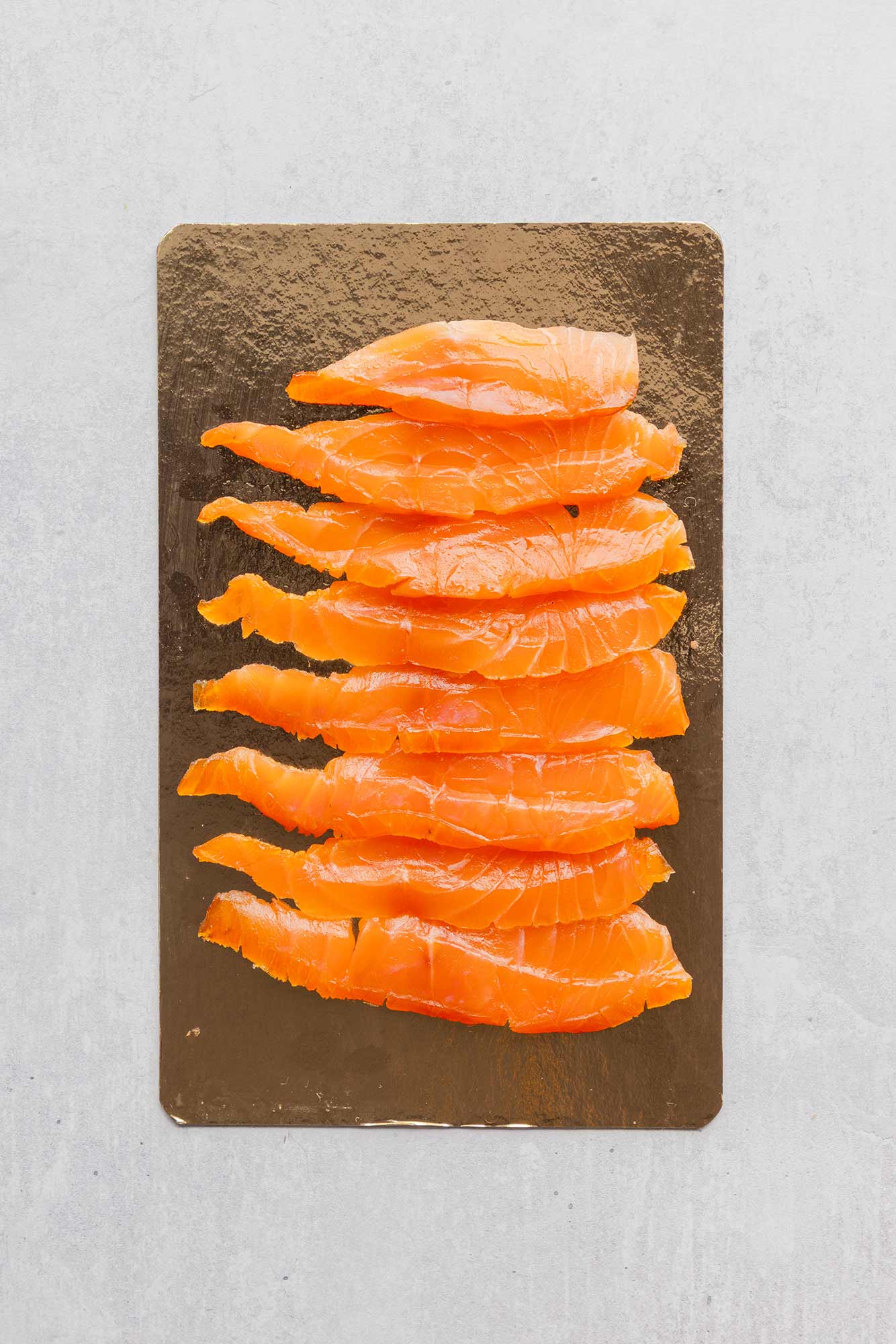 Rockfish Glenarm double smoked Salmon sliced - 100g on a board