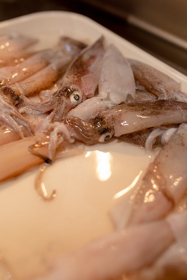 Quick fried squid with garlic, lemon and Sauce Romesco