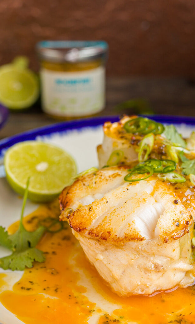 Roasted monkfish chop with lime pickle butter