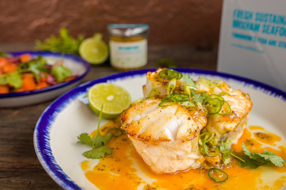Roasted monkfish chop with lime pickle butter