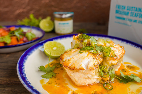 Roasted monkfish chop with lime pickle butter