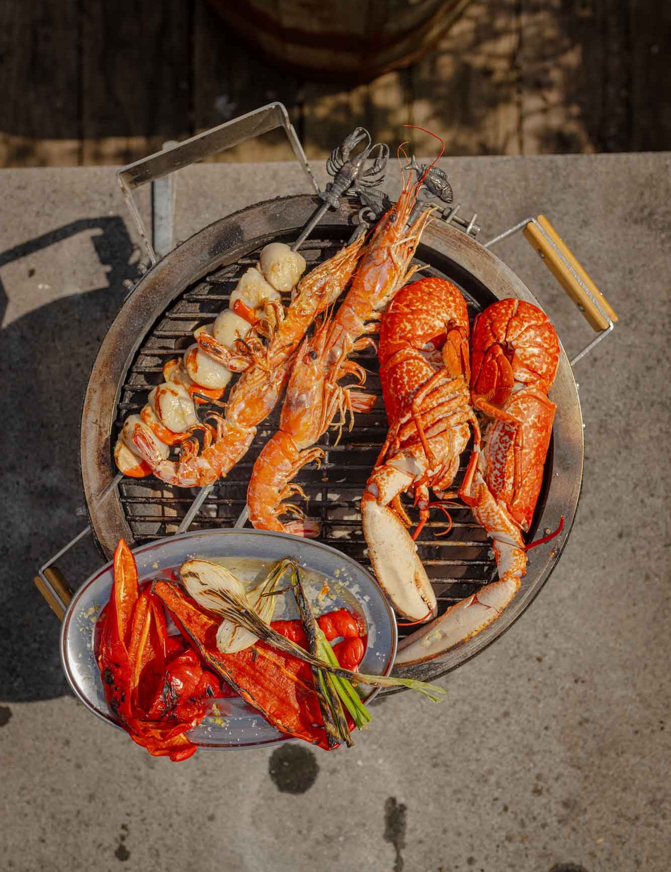 Mixed grill of Rockfish shellfish on a Monolith BBQ