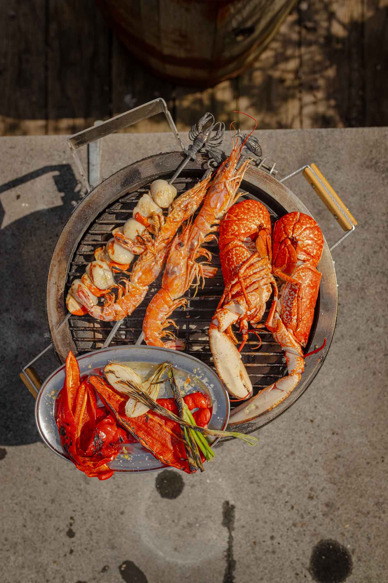 Mixed grill of Rockfish shellfish on a Monolith BBQ