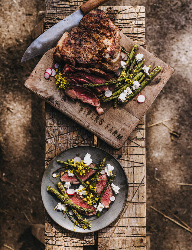 Image of roasted meat on Pipers Farm wooden board