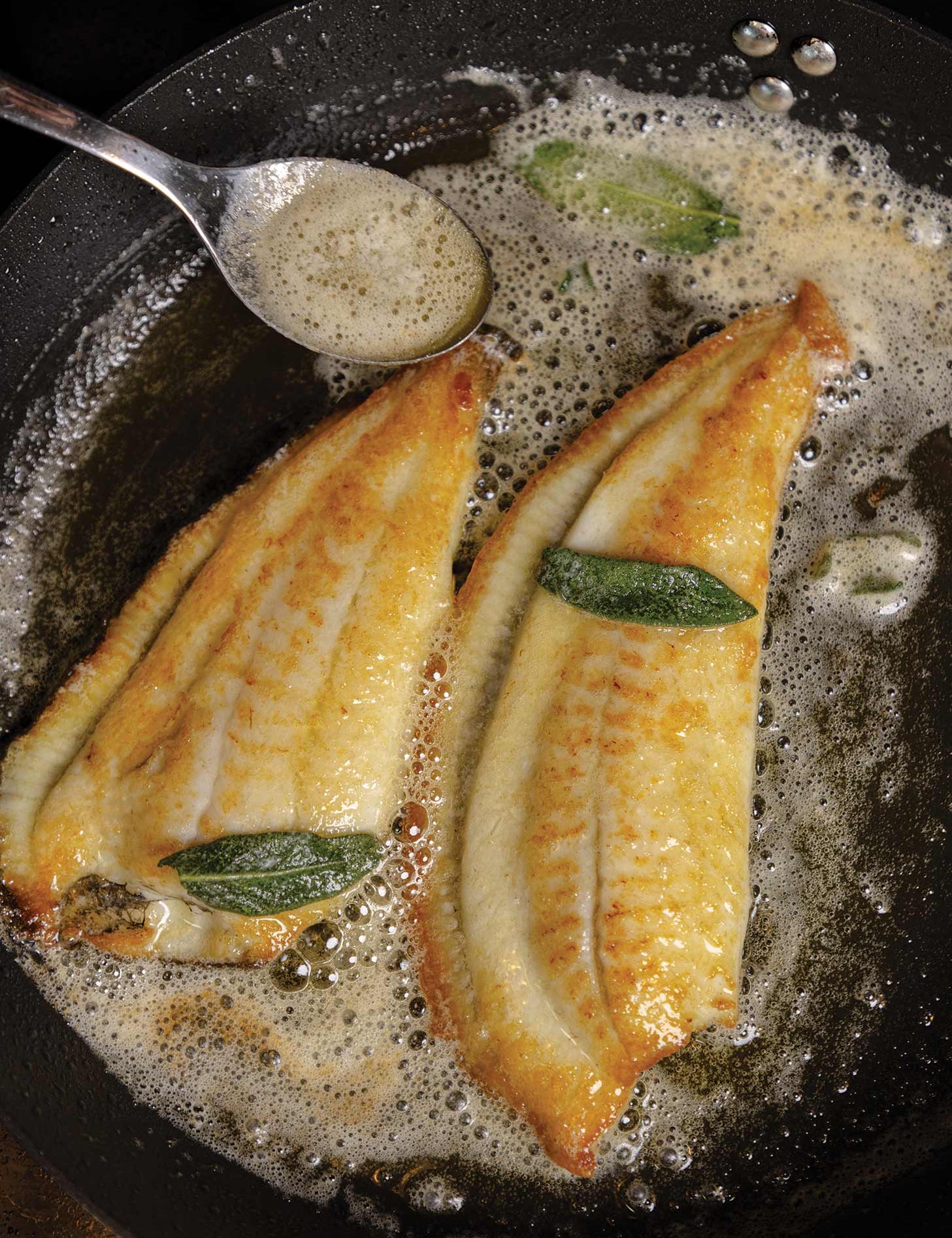 Brill fillets with garlic butter and age