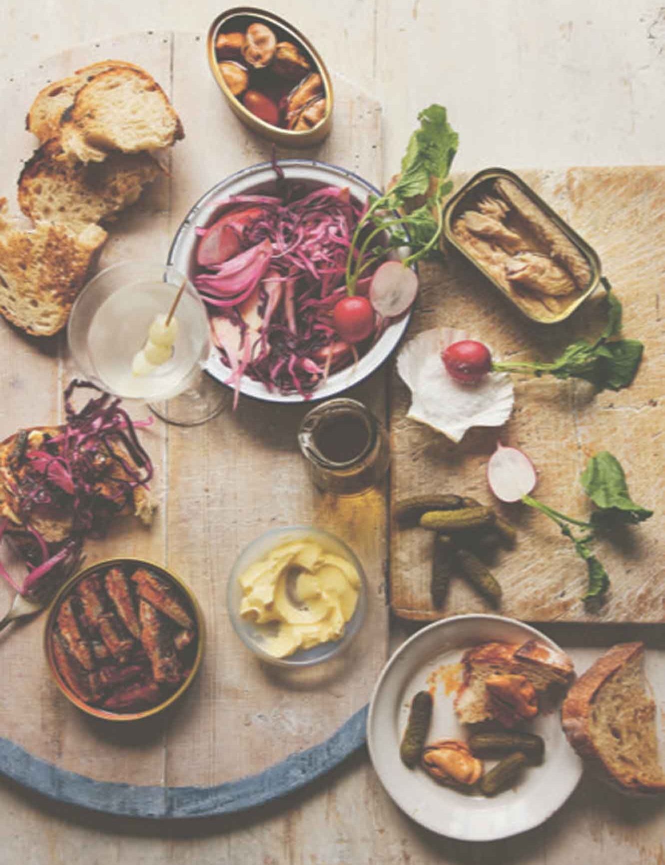 Tinned fish board with toast, pickles, fennel & red cabbage slaw