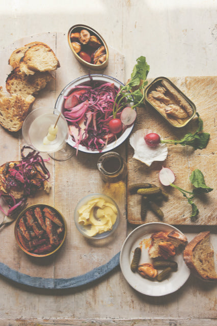 Tinned fish board with toast, pickles, fennel & red cabbage slaw