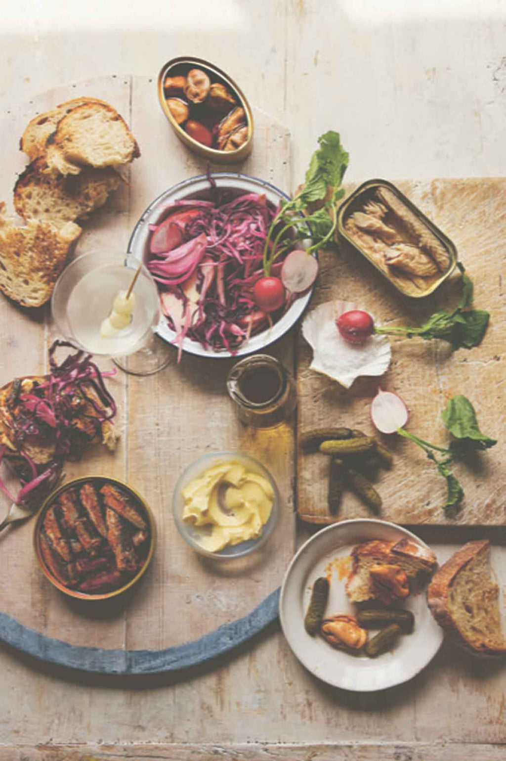 Tinned fish board with toast, pickles, fennel & red cabbage slaw