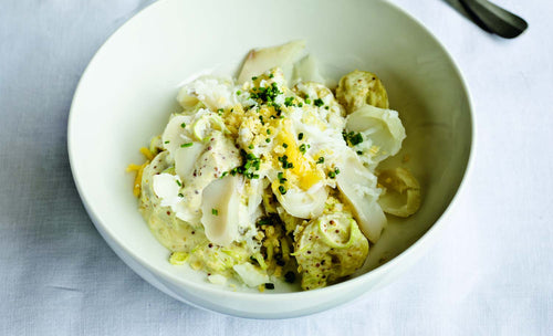 A bowel of smoked haddock, potato, leek and egg salad