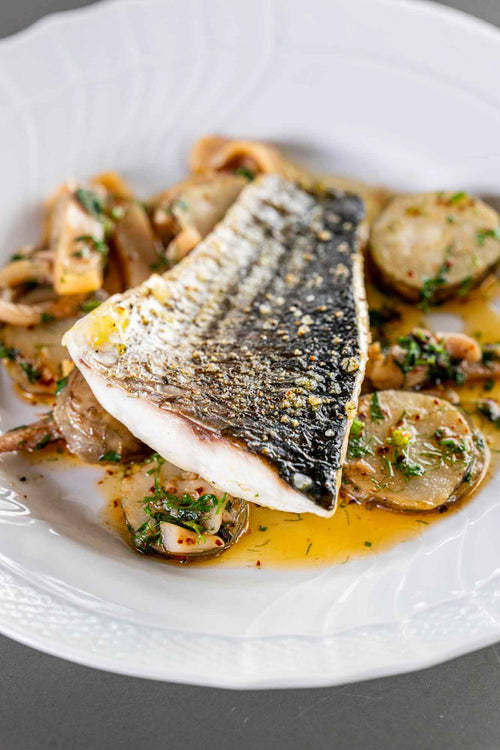 Fillet of silver mullet with Jerusalem artichokes and squid