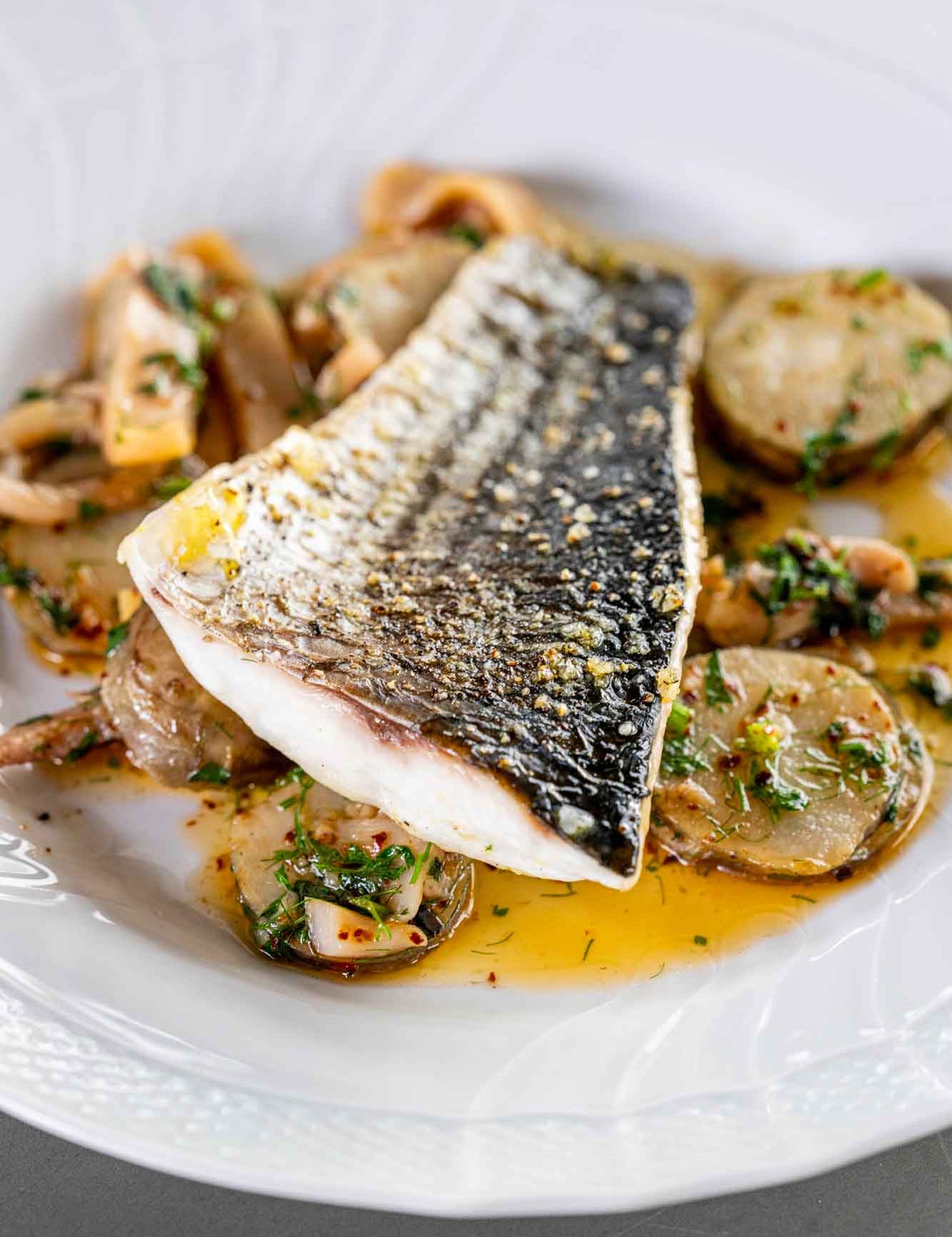 Fillet of silver mullet with Jerusalem artichokes and squid