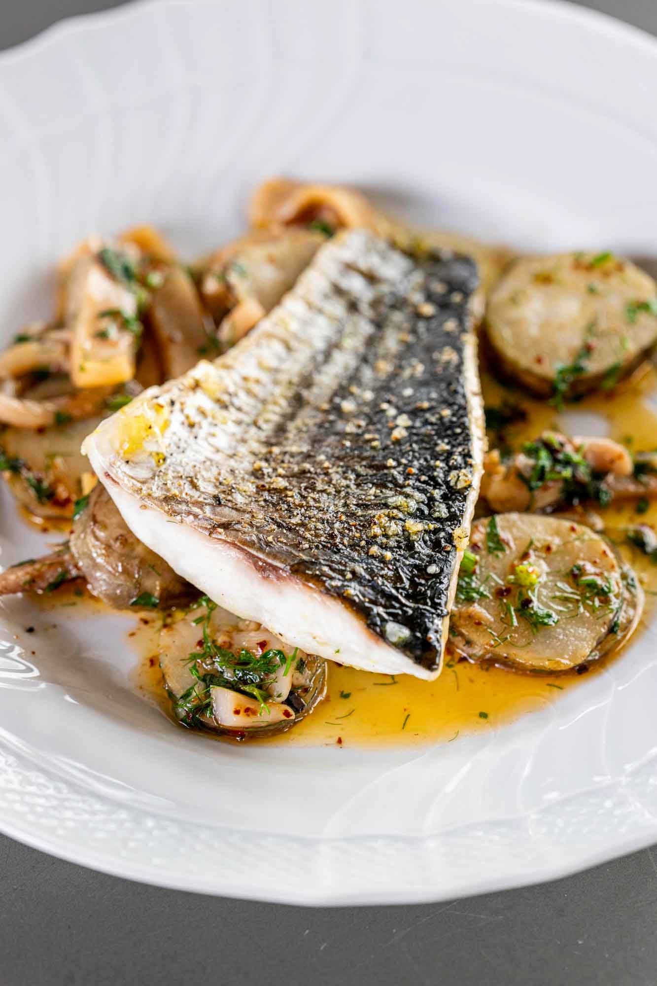 Fillet of silver mullet with Jerusalem artichokes and squid