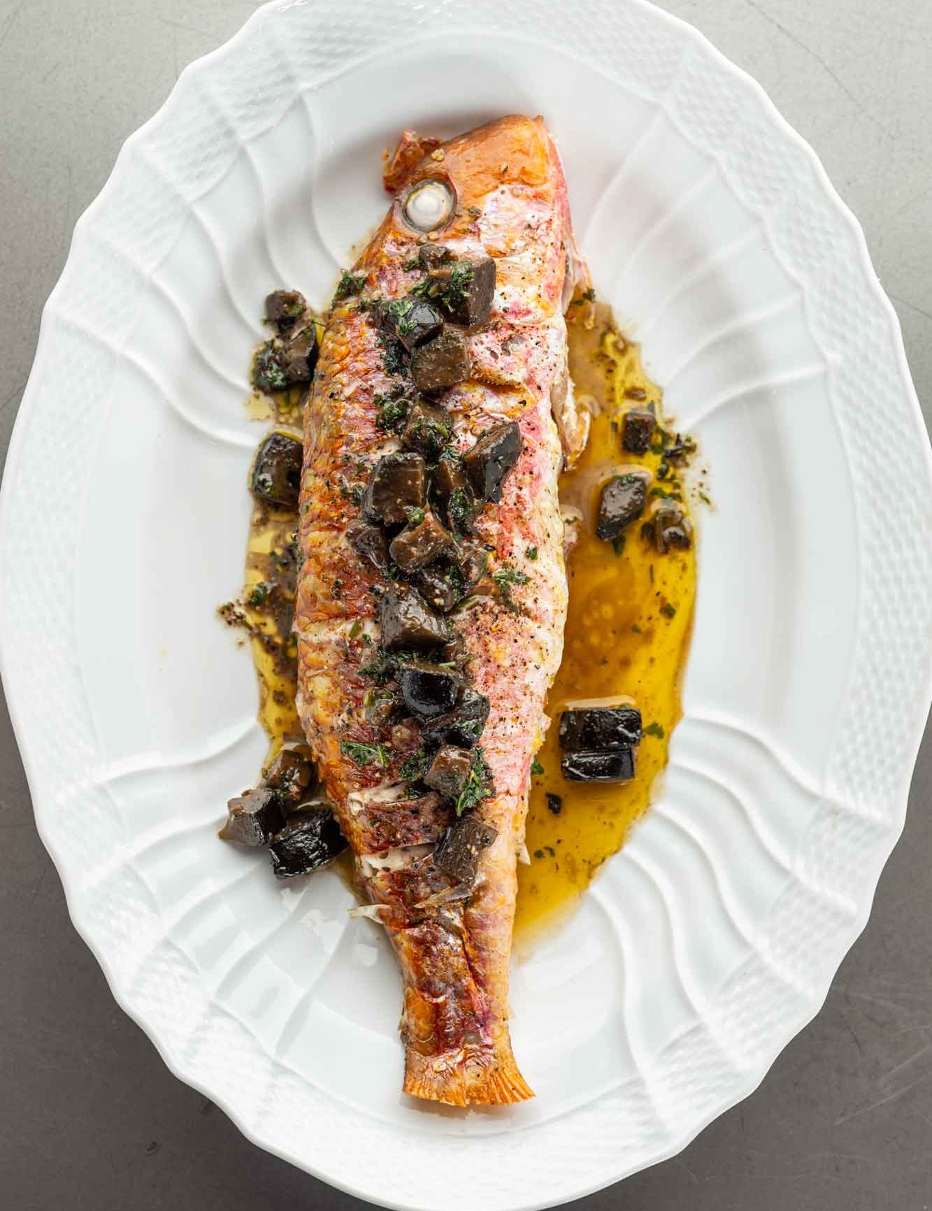Whole roasted red mullet with pickled walnuts