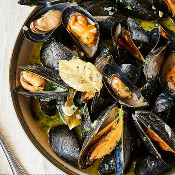 A bowl of cooked mussels