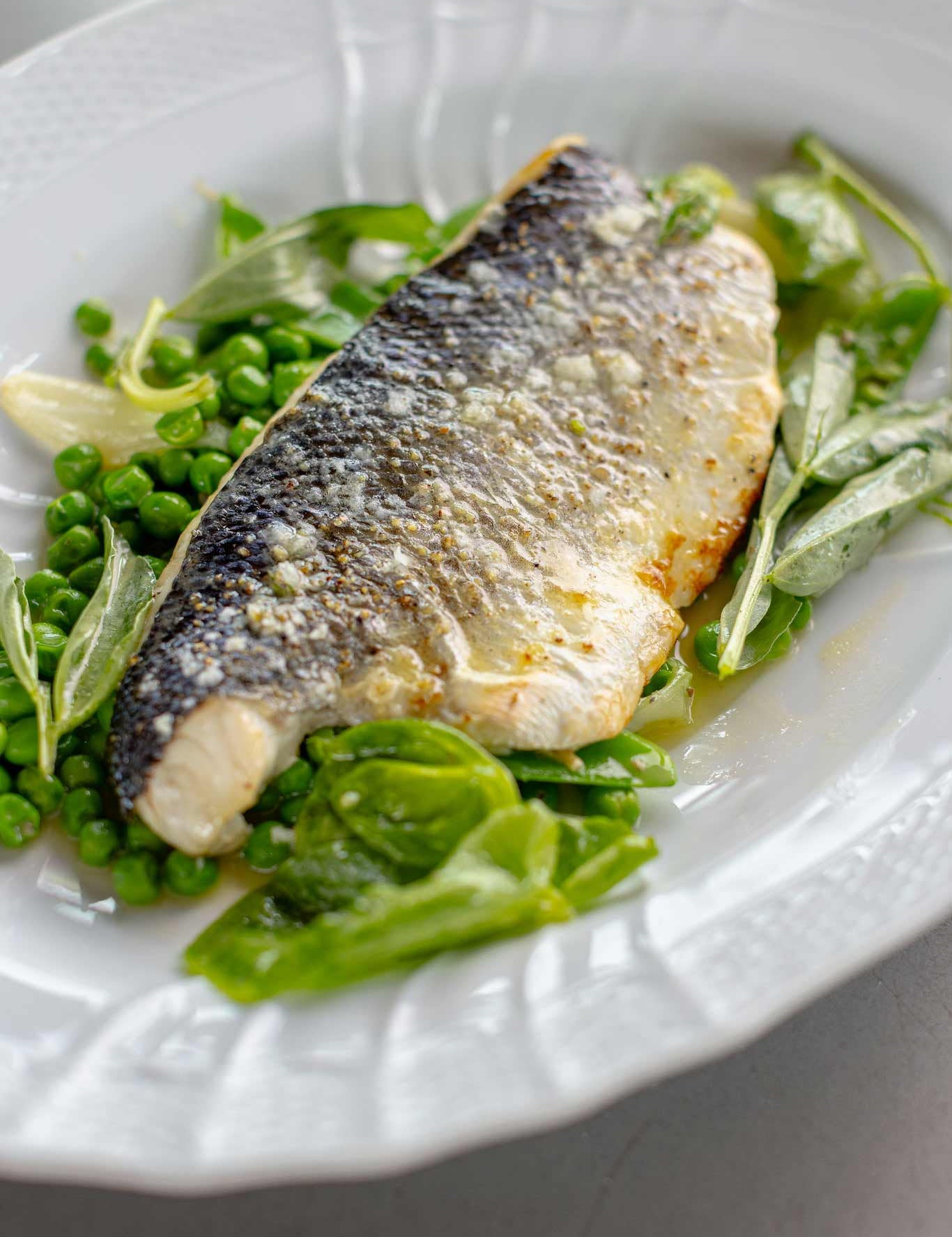 Sea bass with peas