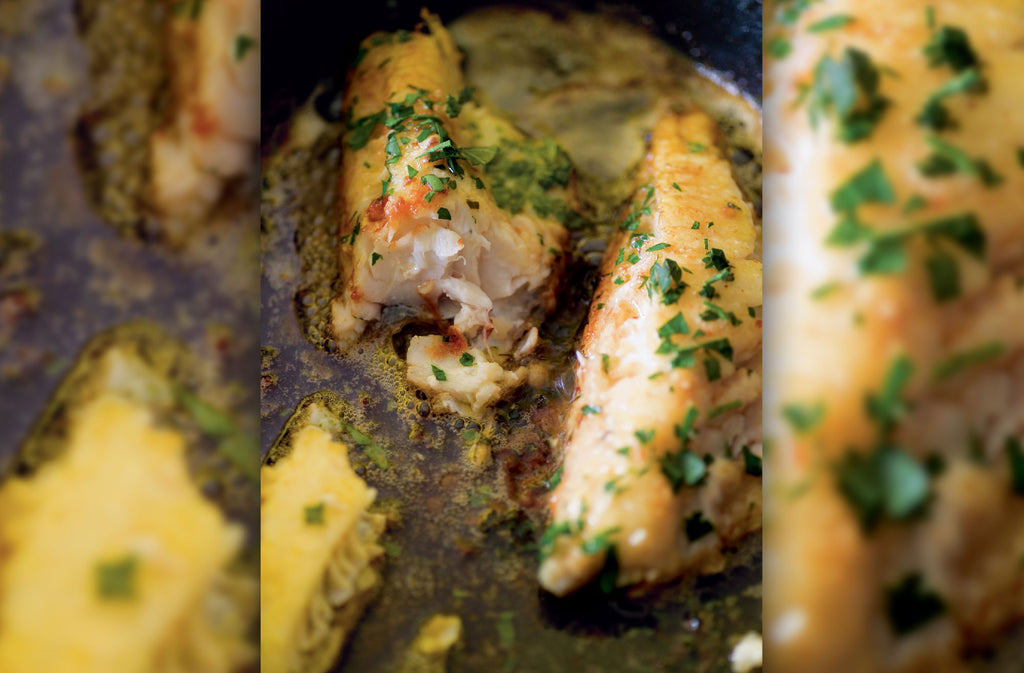 Close up of Rockfish Gurnard Fillet cooked in Butter with Lemon and Parsley