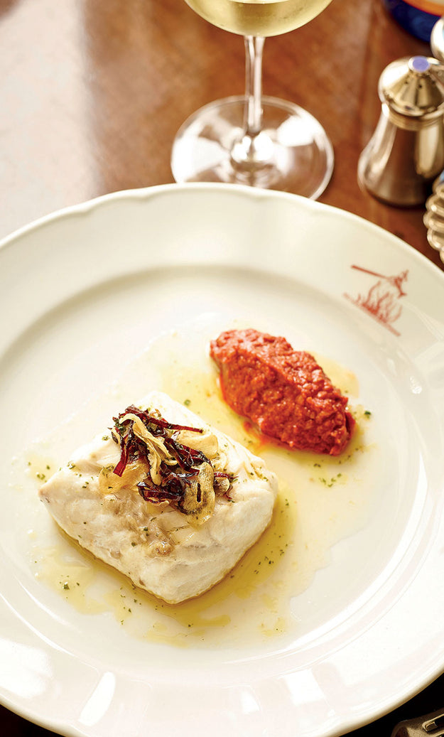 Hake cooked in the Basque style with garlic & sauce Romesco