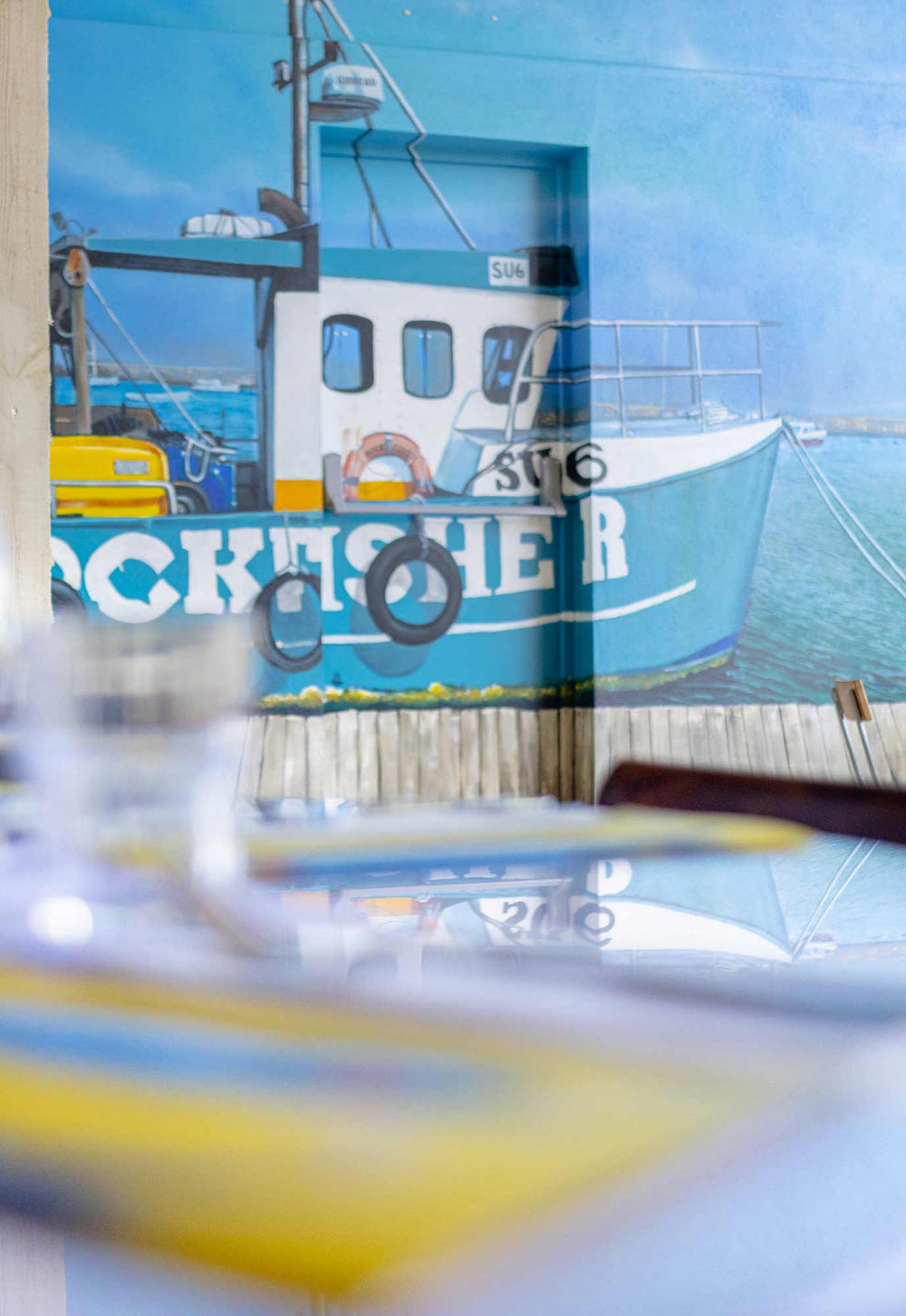 Rockfisher painted on the wall in Salcombe