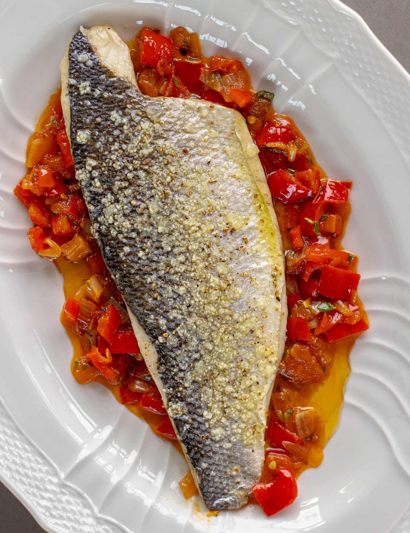 A wild caught sea bass fillet from Brixham prepared by Rockfish online seafood market on Peperonata