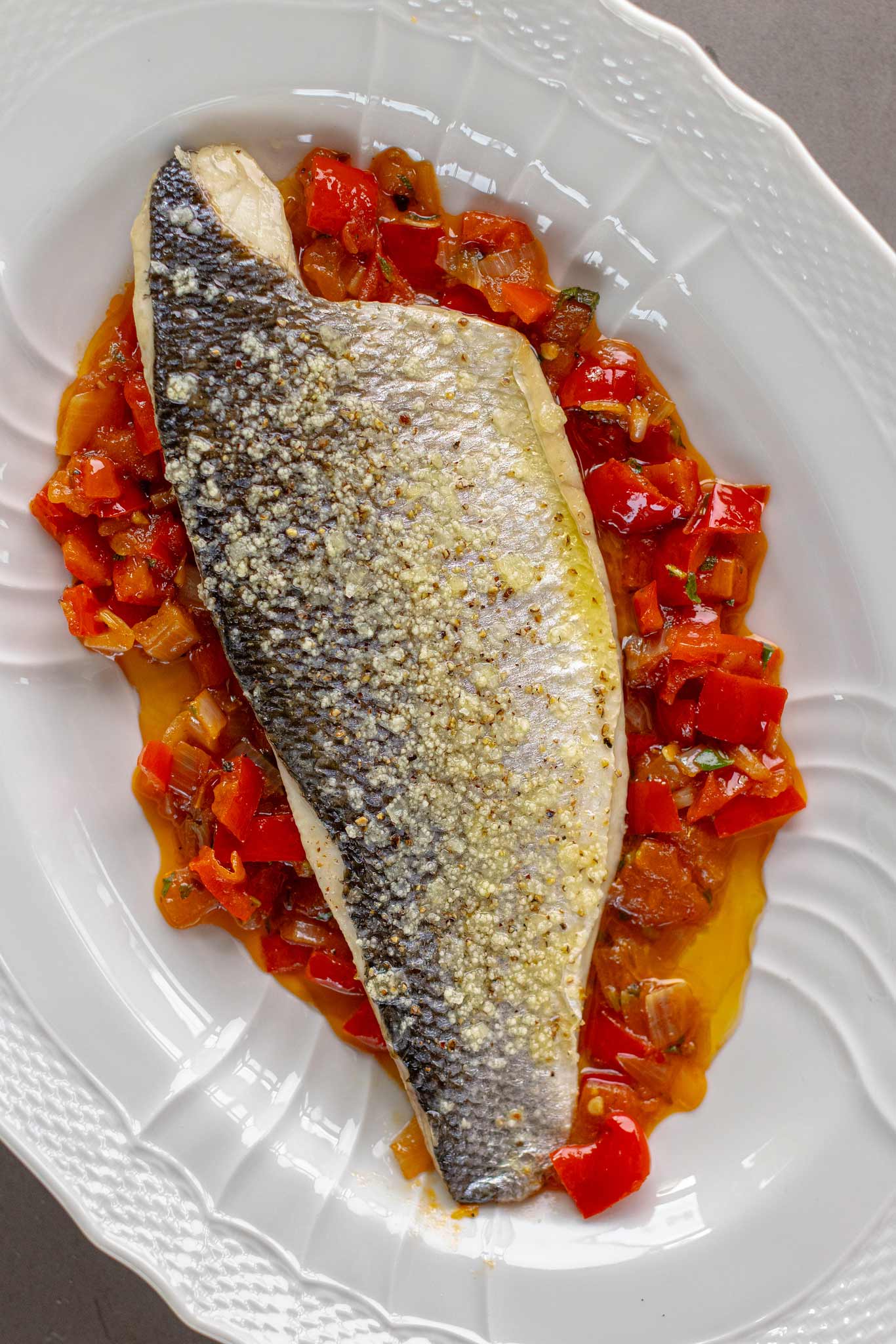 A wild caught sea bass fillet from Brixham prepared by Rockfish online seafood market on Peperonata