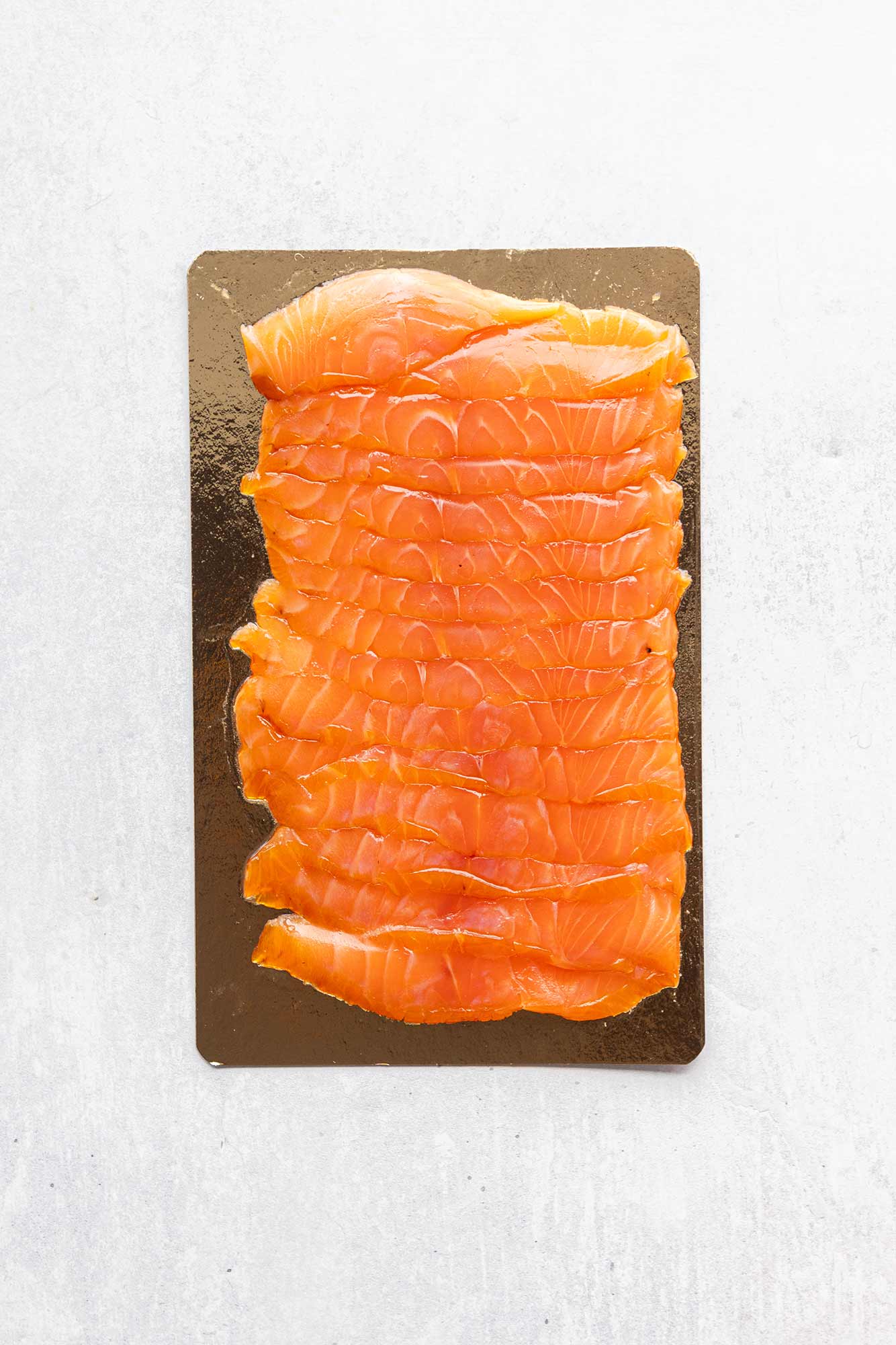 Rockfish Glenarm double smoked Salmon sliced - 200g on a board