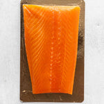 Rockfish Glenarm Salmon double smoked 500g on gold board
