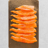 Rockfish Glenarm double smoked Salmon sliced - 100g on a board