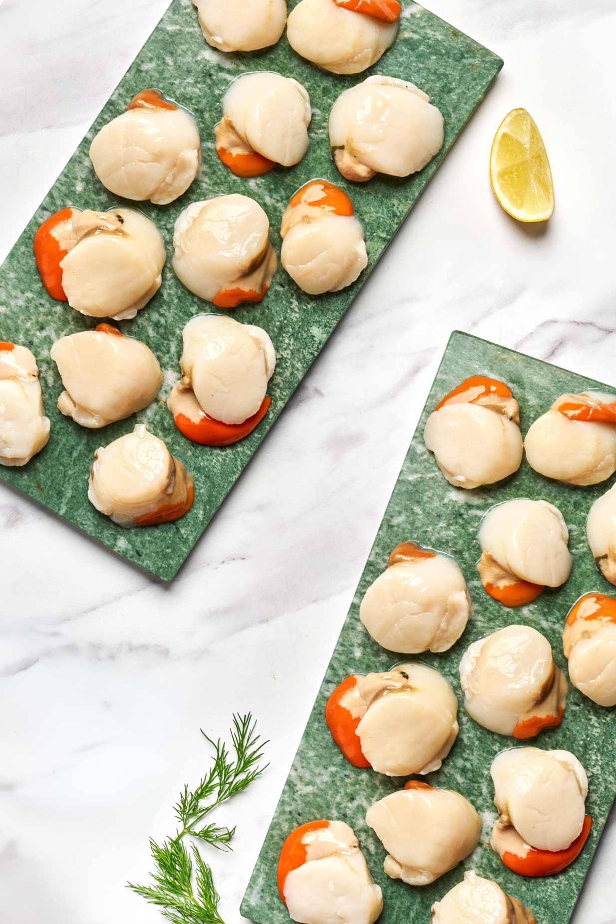 2 dozen diver caught scallops on marble