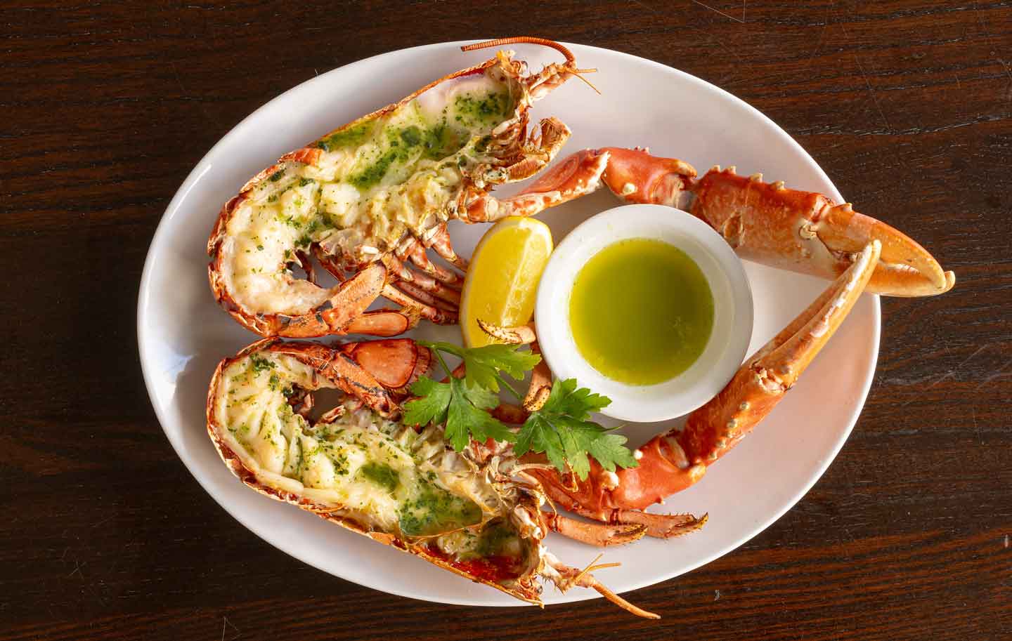 Enjoy cooked lobster at Rockfish with garlic butter