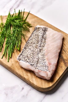Hake cooked in the Basque style with garlic & sauce Romesco – Rockfish
