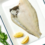 A portion of Plaice fillet from Rockfish Online Seafood Market on a baking tray