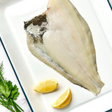A portion of Plaice fillet from Rockfish Online Seafood Market on a baking tray