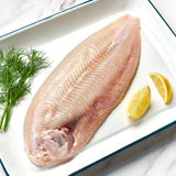 A portion of sand sole from Rockfish Online Seafood Market on a baking tray