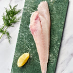 A portion of gurnard fillet from Rockfish Online Seafood Market on a piece of marble