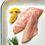 A portion of Red Mullet fillets from Rockfish Online Seafood Market on a baking tray