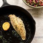 A portion of Gurnard fillet from Rockfish Online Seafood Market cooked in a cast iron skillet skin side down