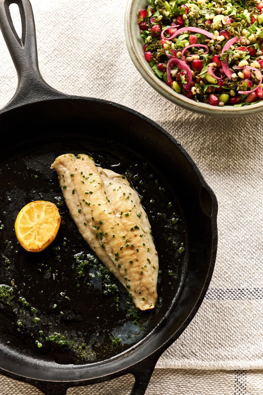A portion of Gurnard fillet from Rockfish Online Seafood Market cooked in a cast iron skillet skin side down