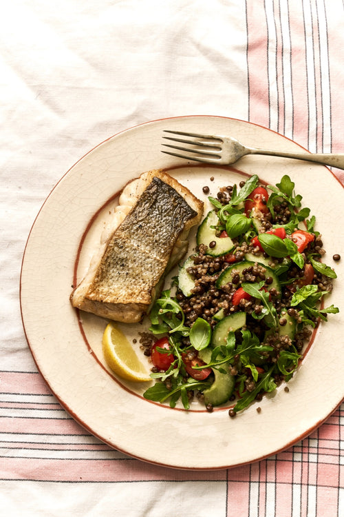 A fillet of Coley with a healthy salad on the side