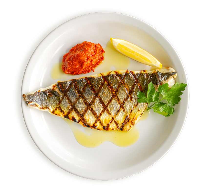 Chargrilled sea bass fillet served with Romesco sauce at Rockfish restaurants 