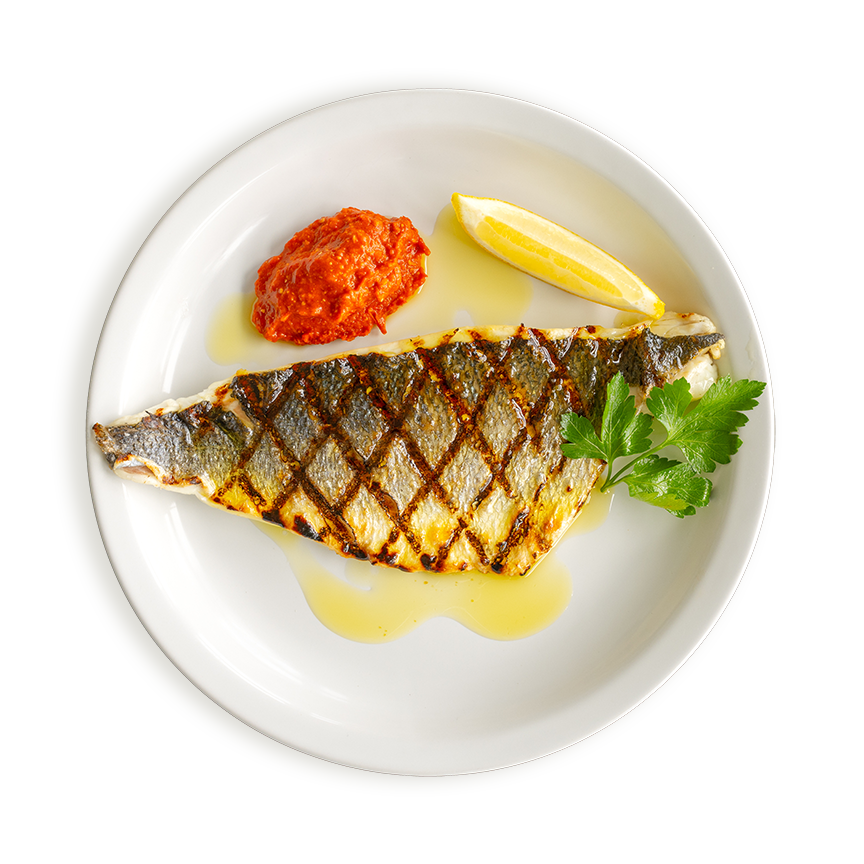 Chargrilled sea bass fillet served with Romesco sauce at Rockfish restaurants 