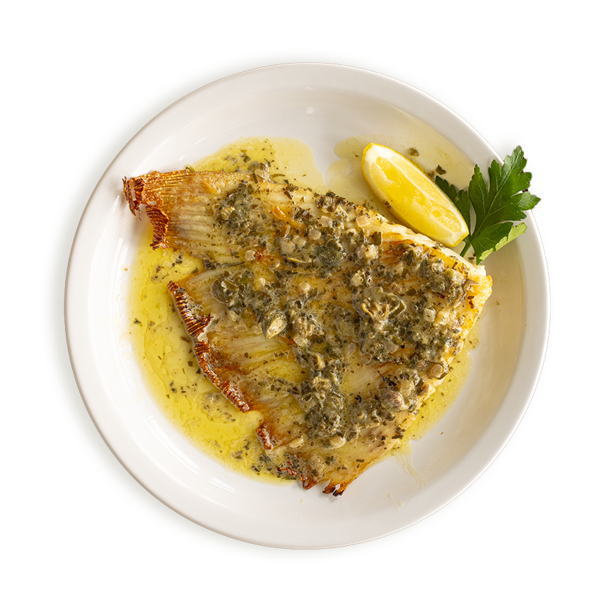 A grilled ray wing served with a caper & parsley butter in Rockfish restaurants