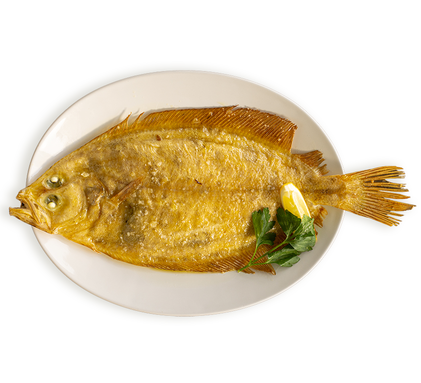 Whole megrim cooked simply with some oil and salt. Served with a wedge of lemon at Rockfish restaurants