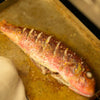 A whole cooked red mullet