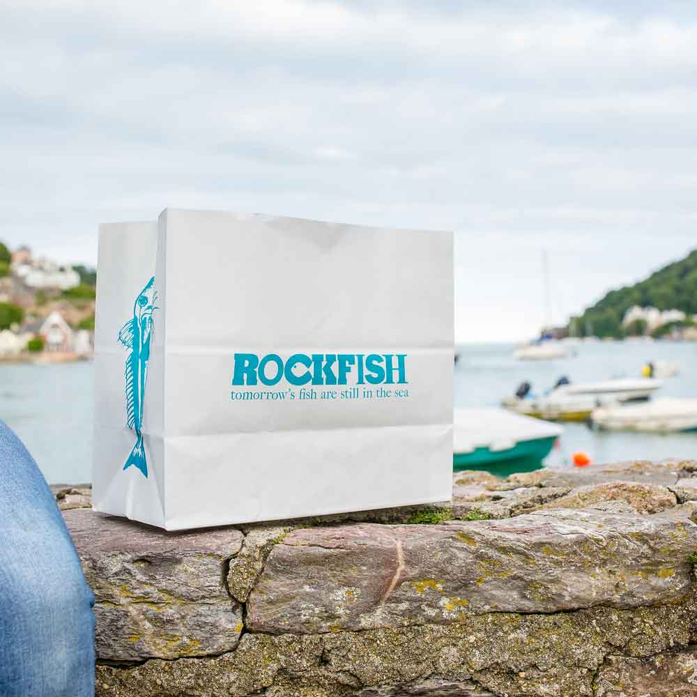 Rockfish fish & chip bag on a wall in Dartmouth