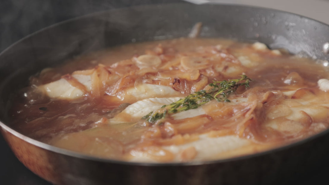 Fillets of Plaice being poached in Cider for a beautiful seafood recipe by Rockfish