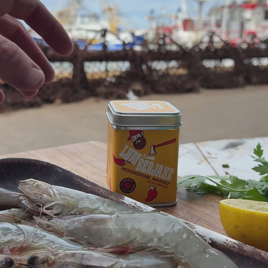 Raw shell on prawns being cooked on the BBQ