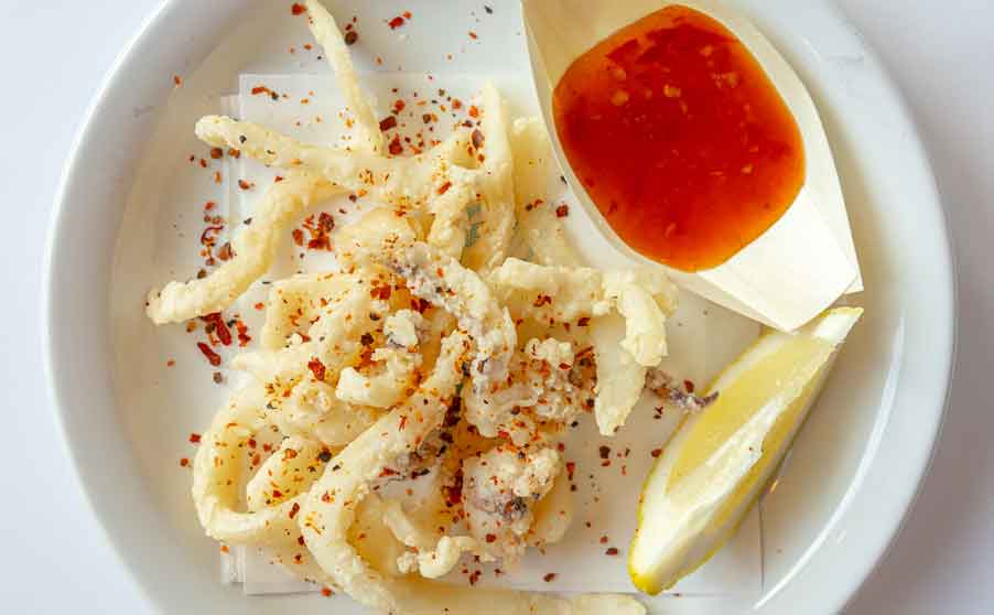 Crisp fried cuttlefish sprinkled with Kampot spice blend, served with Singapore chilli sauce