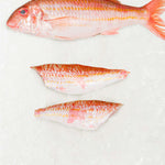 Frozen Red mullet fillets on ice