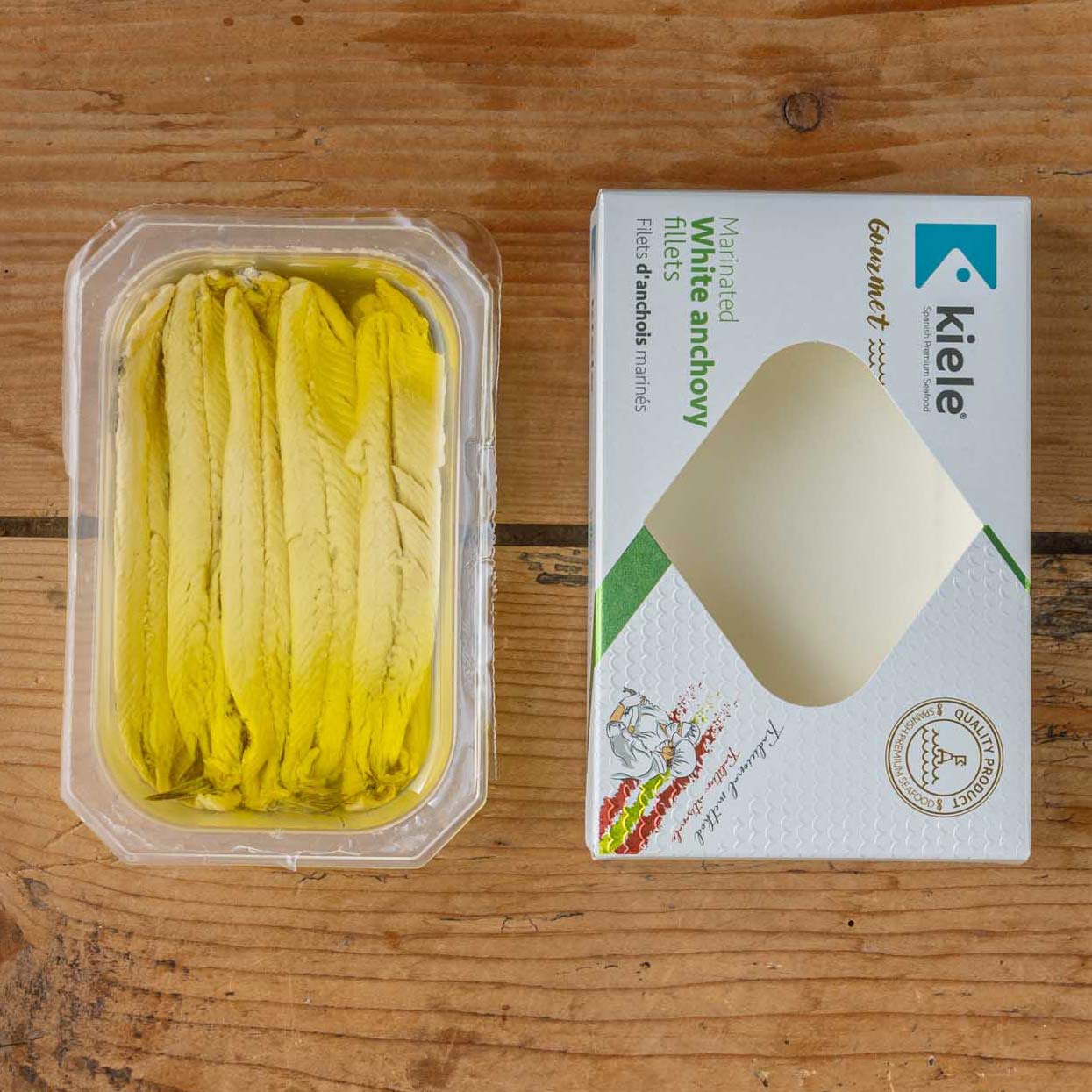 #slide:Cantabrian boquerones out of their packaging